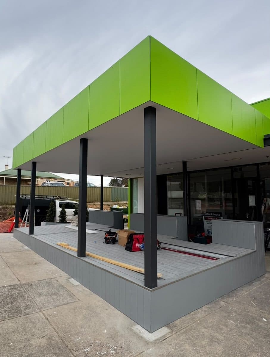 Commercial painters Marion – shopfront repaint with lime green fascia and charcoal posts